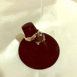 silver ring with black stone